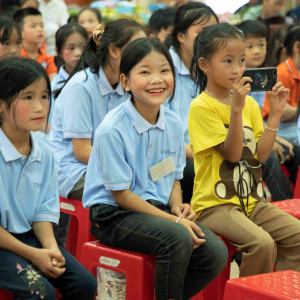 Photo 1 students attend a ceremony